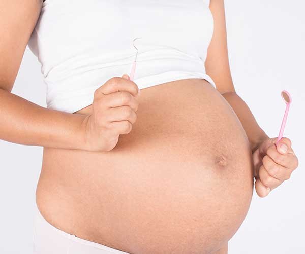 Can a tooth infection harm my unborn baby? Can a tooth infection harm my unborn baby?