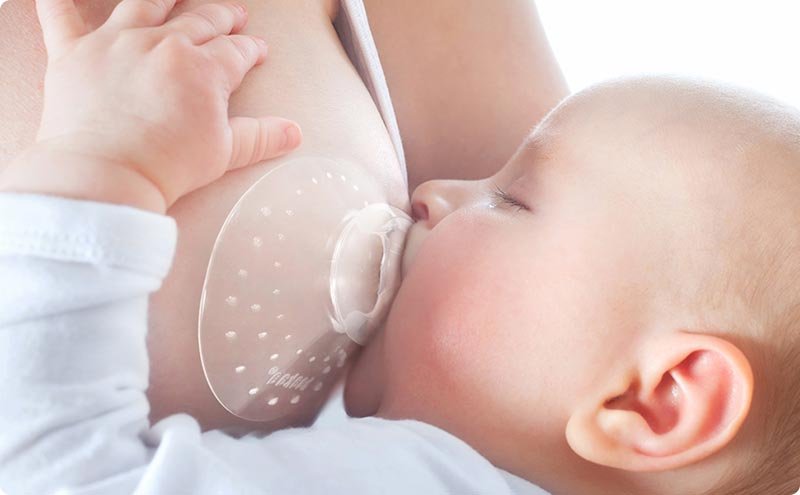 Sharp Pain in Breast while Breastfeeding: Improper latch