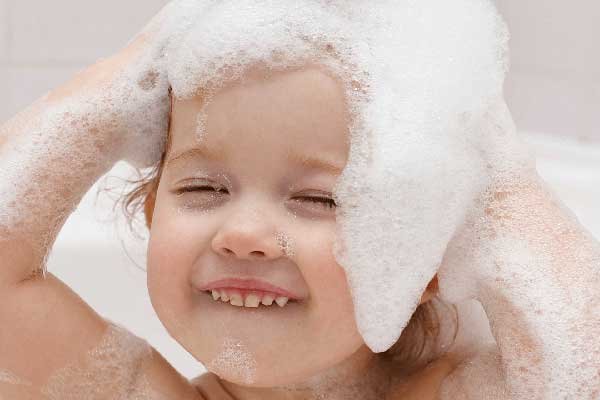 13 Tips to Make Baby Hair Grow Fast: Shampoo regularly