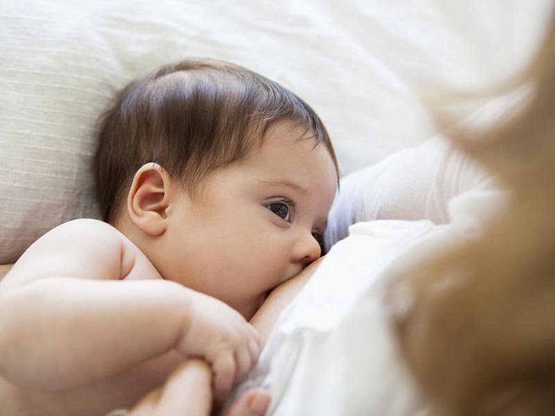What causes sharp pain in the nipple while breastfeeding?